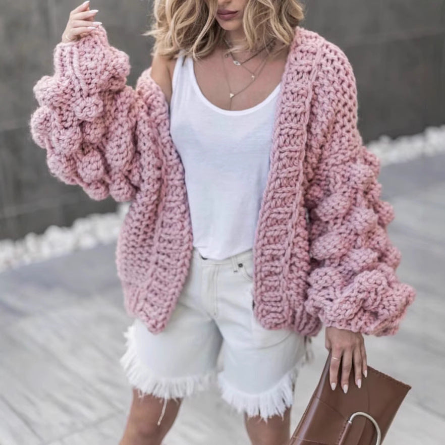 Damig grovstickad oversized cardigan med voluminösa ärmar Mirla-Eva Jonsson