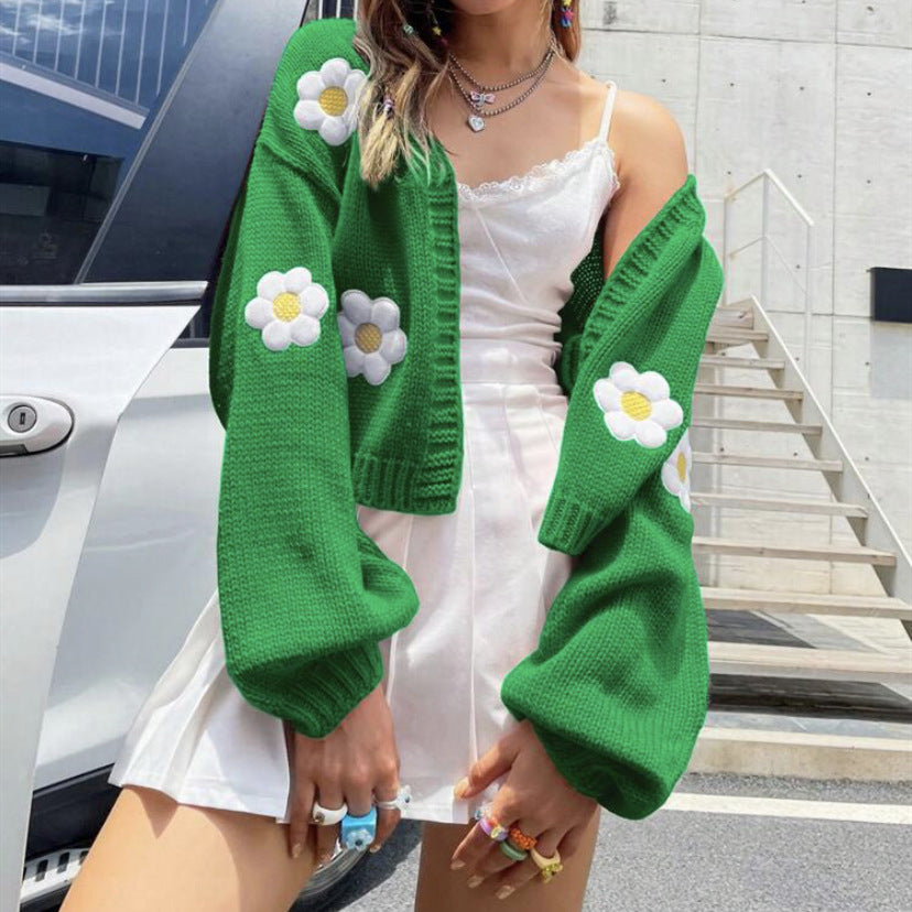 Damin Kort stickad cardigan med lekfullt blommönster Eva Jonsson-Eva Jonsson