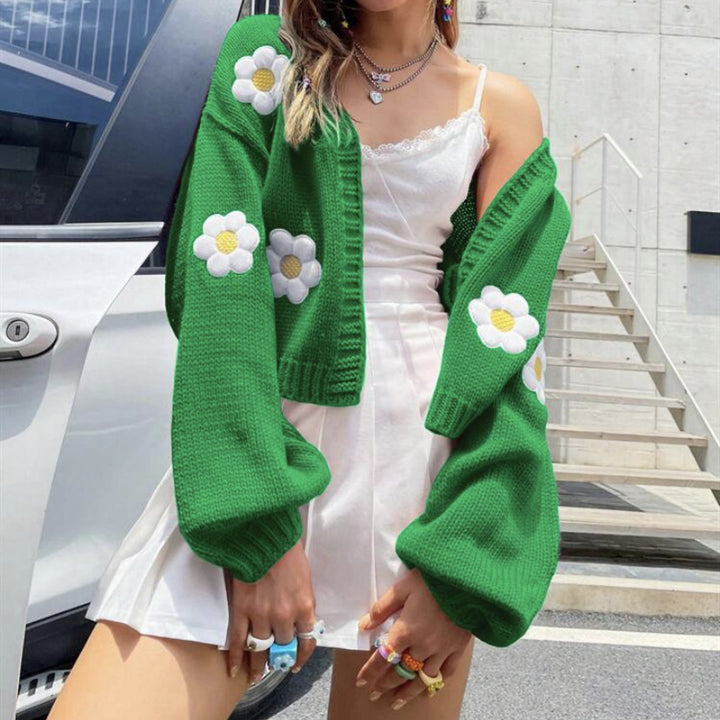 Damin Kort stickad cardigan med lekfullt blommönster Eva Jonsson-Eva Jonsson