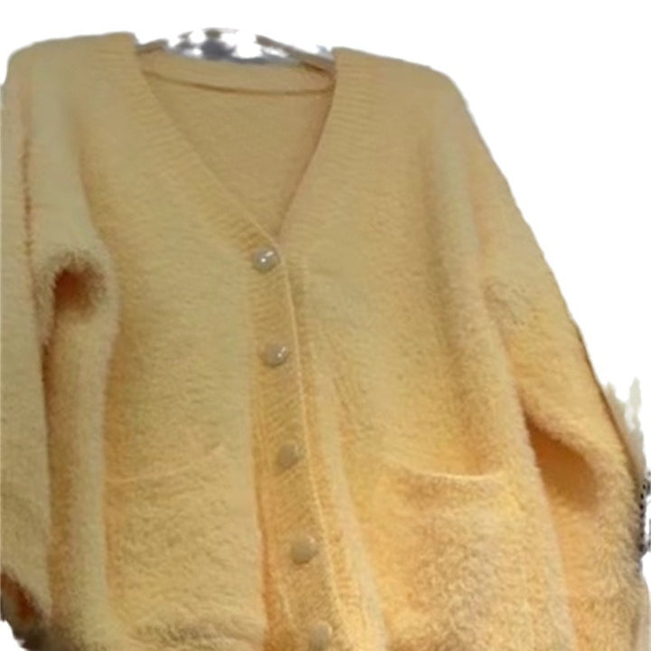 Damin Oversized Stickjacka med Mjuk Fleece och Speciella Knappryck Mirla-Eva Jonsson