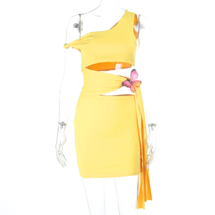 Daming asymmetrisk miniklänning med blomapplikation och cut-out Mirla-Eva Jonsson