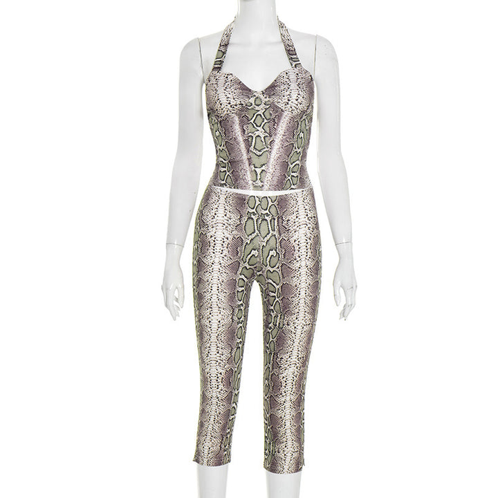 Daming trendiga ormskinn mönstrad jumpsuit med djup uringning Mirla-Eva Jonsson