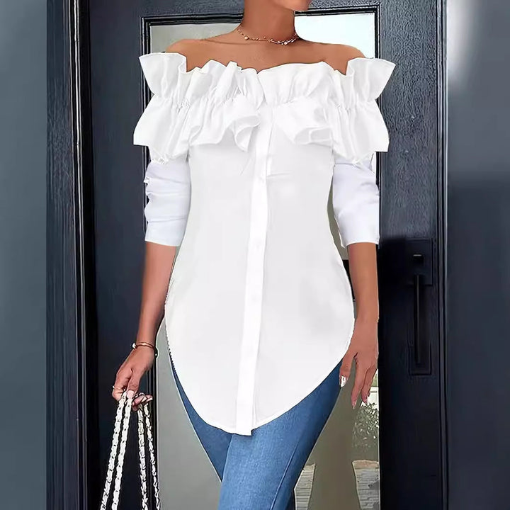 Damingblus med axelavskuren design och voluminösa ruffle-detaljer Mirla-Eva Jonsson