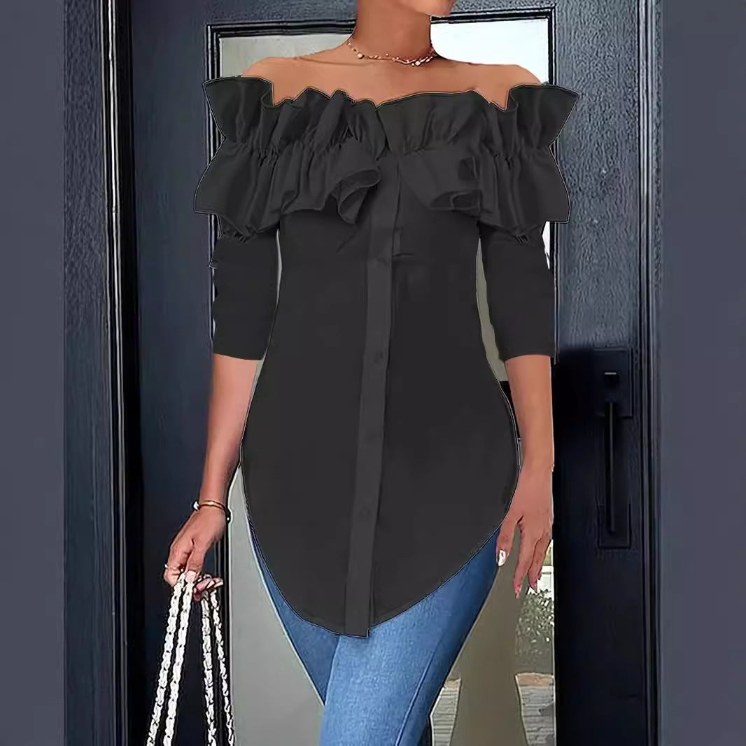 Damingblus med axelavskuren design och voluminösa ruffle-detaljer Mirla-Eva Jonsson