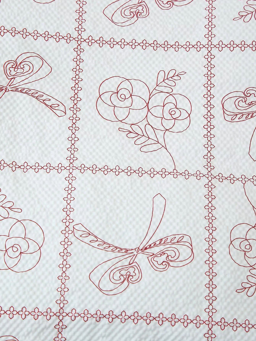 Damjacka med blommönster och praktiska fickor Mirla-Eva Jonsson
