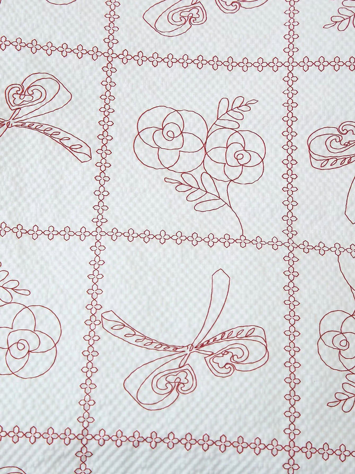 Damjacka med blommönster och praktiska fickor Mirla-Eva Jonsson