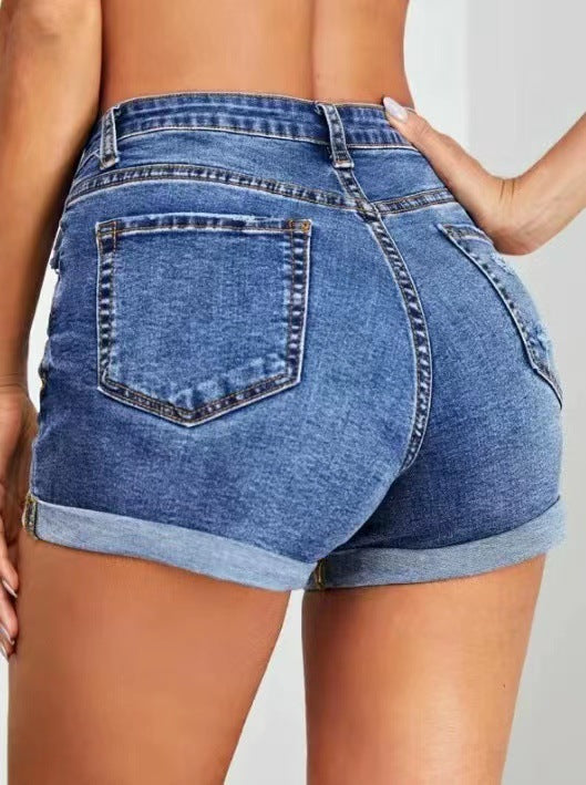Damjeansshorts i vintage-stil med hög midja och förstörda detaljer Eva Jonsson-Eva Jonsson
