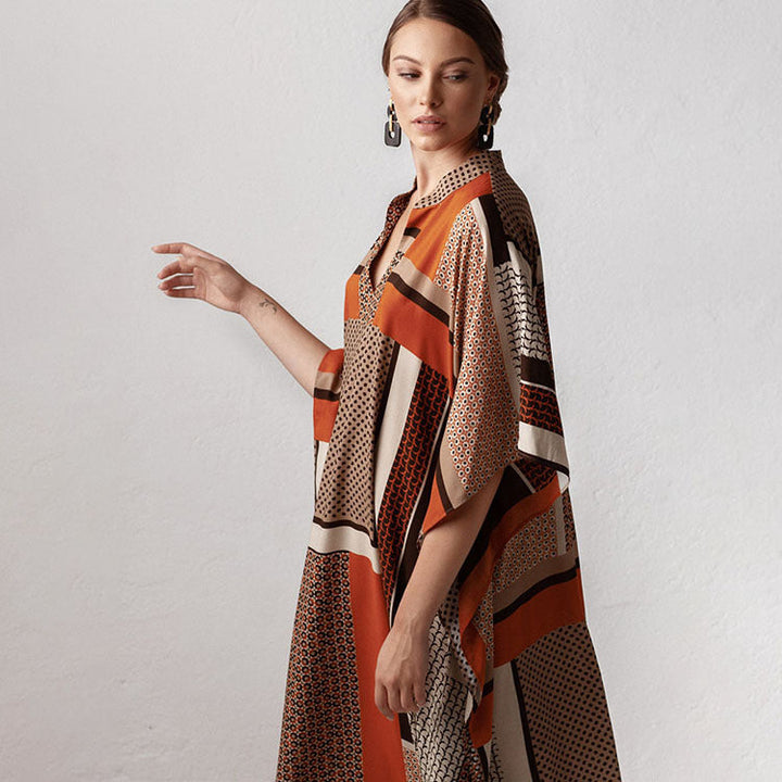 Damkaftan med avslappnad snitt och elegant V-krage Mirla-Eva Jonsson