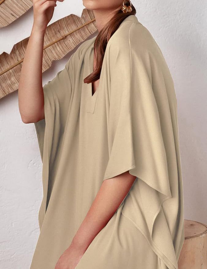Damkaftan med avslappnad snitt och elegant V-krage Mirla-Eva Jonsson