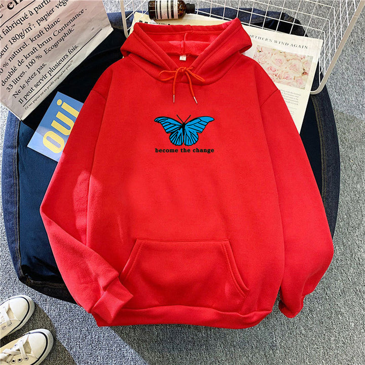 Damkappa med modernt fjärilsmotiv och inspirerande inskrift Mirla-Eva Jonsson