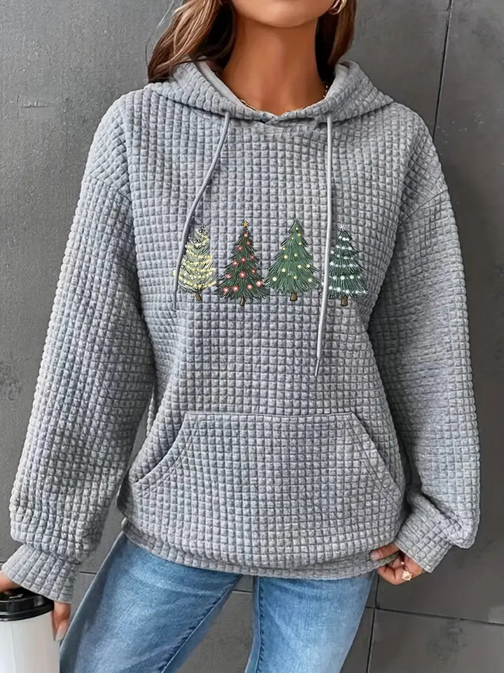 Damkappa med överdimensionerad huva och festligt träddesign Eva Jonsson-Eva Jonsson