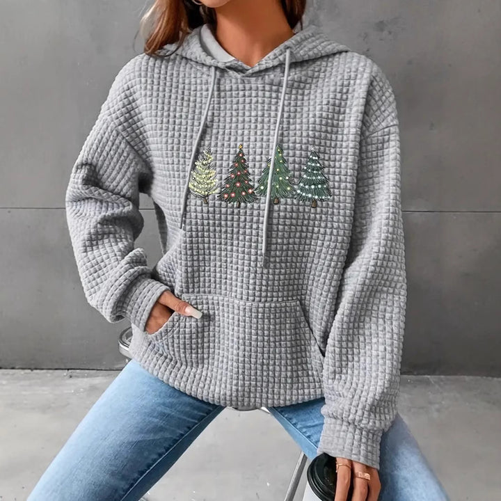Damkappa med överdimensionerad huva och festligt träddesign Eva Jonsson-Eva Jonsson