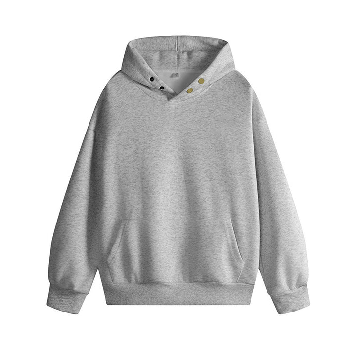 Damkappadpullover med innovativ skärning och praktiska tryckknappar Mirla-Eva Jonsson