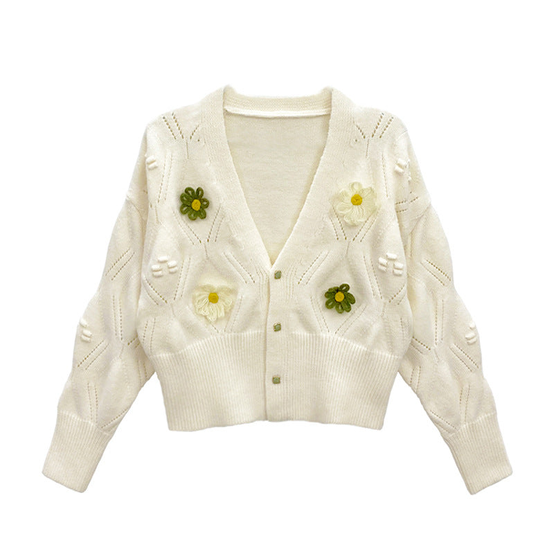 Damkar med blommönster och elegant V-krage Mirla-Eva Jonsson