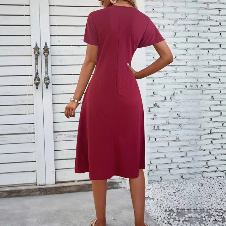 Damkjol med figursydd omslagdesign och elegant V-ringning Mirla-Eva Jonsson