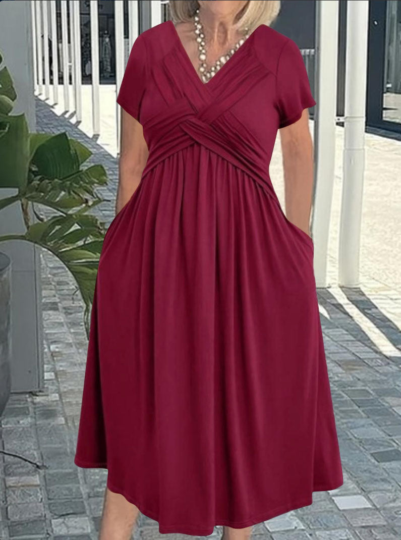 Damkjol med figursydd omslagdesign och elegant V-ringning Mirla-Eva Jonsson