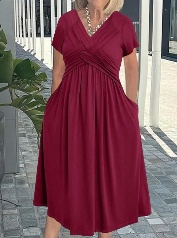 Damkjol med figursydd omslagdesign och elegant V-ringning Mirla-Eva Jonsson