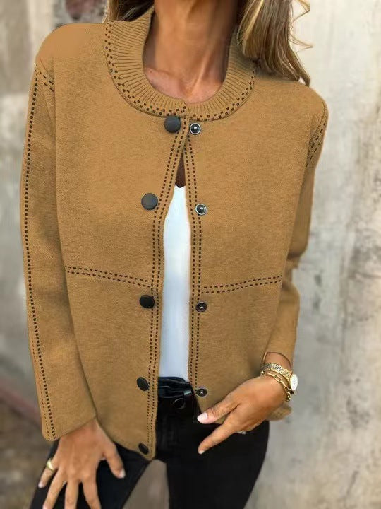 Damkjol med knappslå och elegante halslinje Mirla-Eva Jonsson