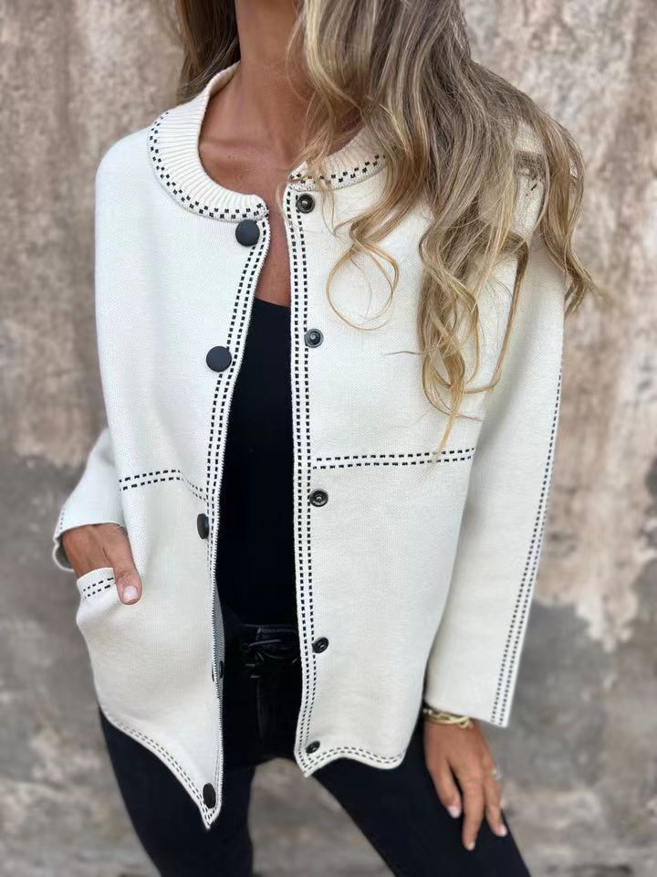 Damkjol med knappslå och elegante halslinje Mirla-Eva Jonsson