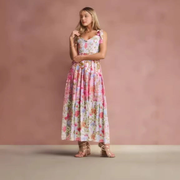 Damkjol med lekfullt blommönster och volangärmar Mirla-Eva Jonsson