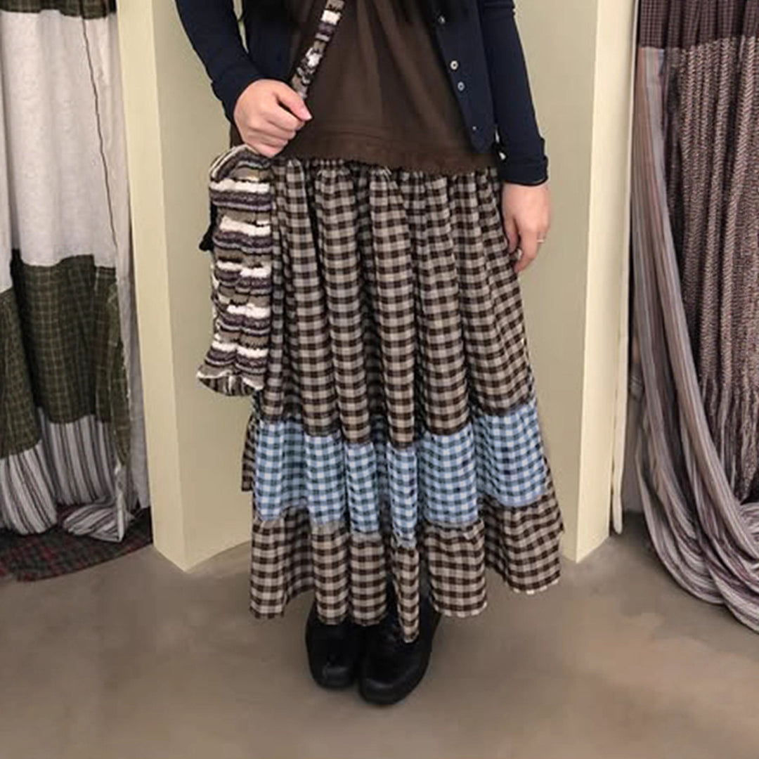 Damkjol med voluminös volangkant och rutigt mönster Mirla-Eva Jonsson