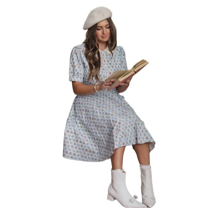 Damklänning med blommönster och klassisk krage Mirla-Eva Jonsson