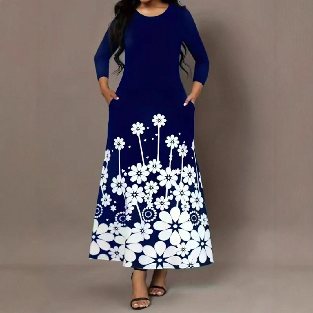 Damklänning med blommönster och praktiska fickor Mirla-Eva Jonsson