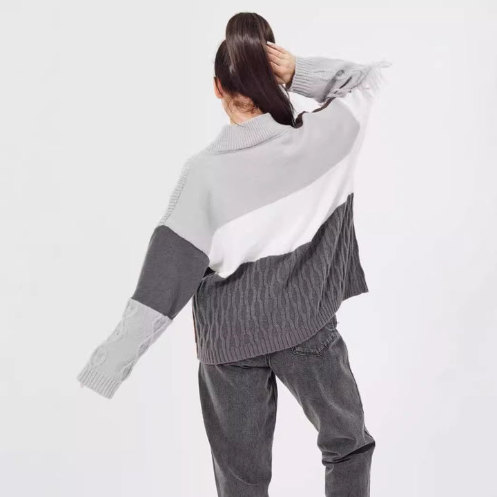 Damkofta i grovt stickat med modernt färgblocksdesign och knäppning Mirla-Eva Jonsson