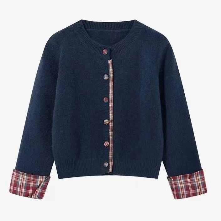 Damkofta med rutmönster och eleganta knappdetaljer Mirla-Eva Jonsson