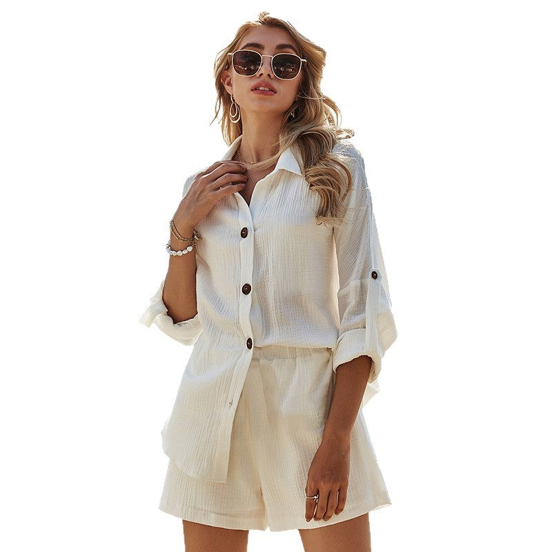 Damkortärmad jumpsuit med knappar och elastisk midja Mirla-Eva Jonsson
