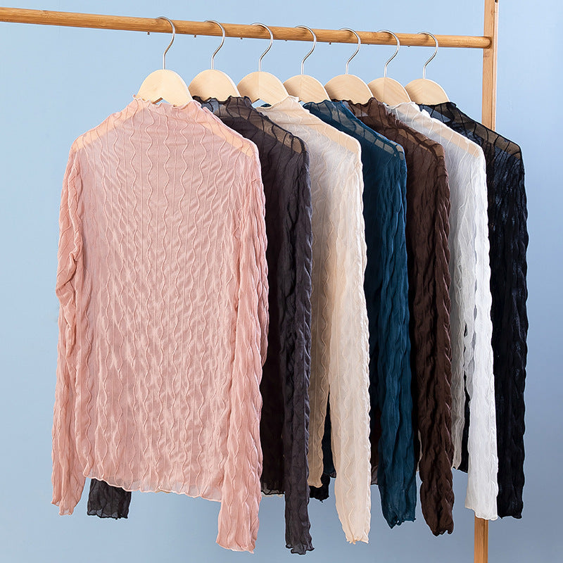 Damlig topp med tvärstrimmig design Mirla-Eva Jonsson