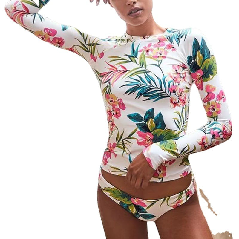 Dammars Uv-skydd baddräkt med långa ärmar och blommönster Mirla-Eva Jonsson