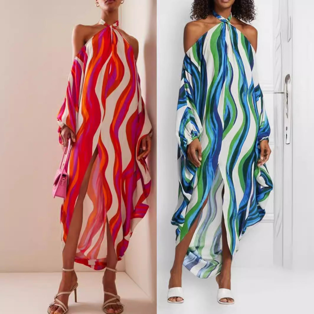 Dammaxiklänning med asymmetrisk nederkant och fashionabla ränder Mirla-Eva Jonsson