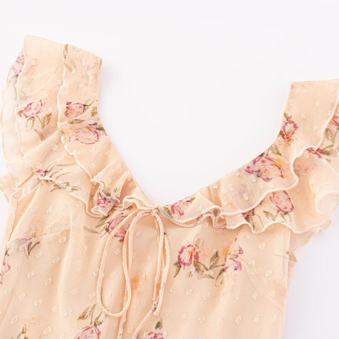 Dammens Maxiklänning med blommig design och eleganta volangdetaljer Mirla-Eva Jonsson