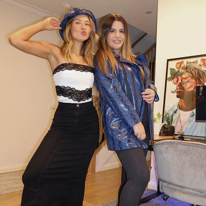 Dammens bandeau-top med elegant spetsdetalj och figursmickrande passform Mirla-Eva Jonsson