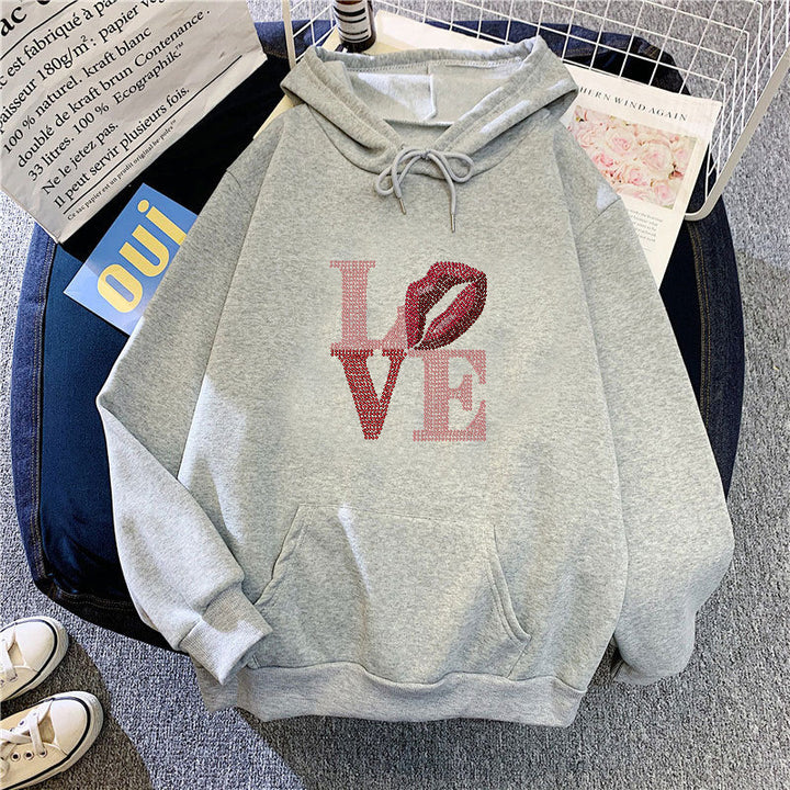 Dammens hoodie med kreativ läppdesign Mirla-Eva Jonsson