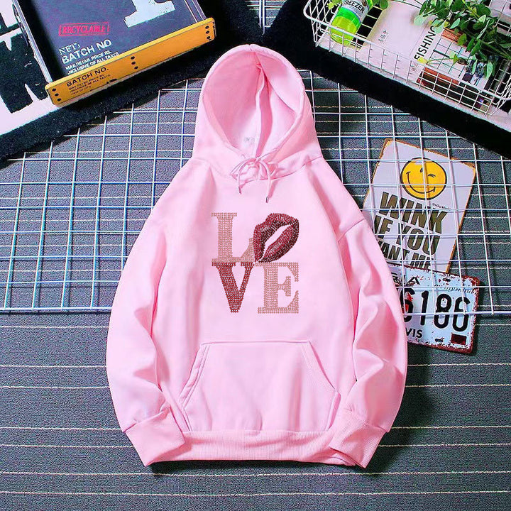 Dammens hoodie med kreativ läppdesign Mirla-Eva Jonsson