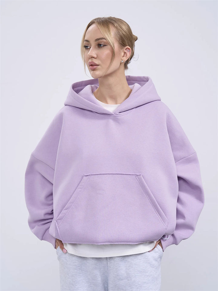 Dammens oversized huvtröja med sidofickor och avslappnad passform Mirla-Eva Jonsson