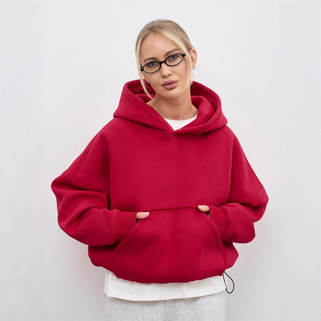 Dammens oversized huvtröja med sidofickor och avslappnad passform Mirla-Eva Jonsson