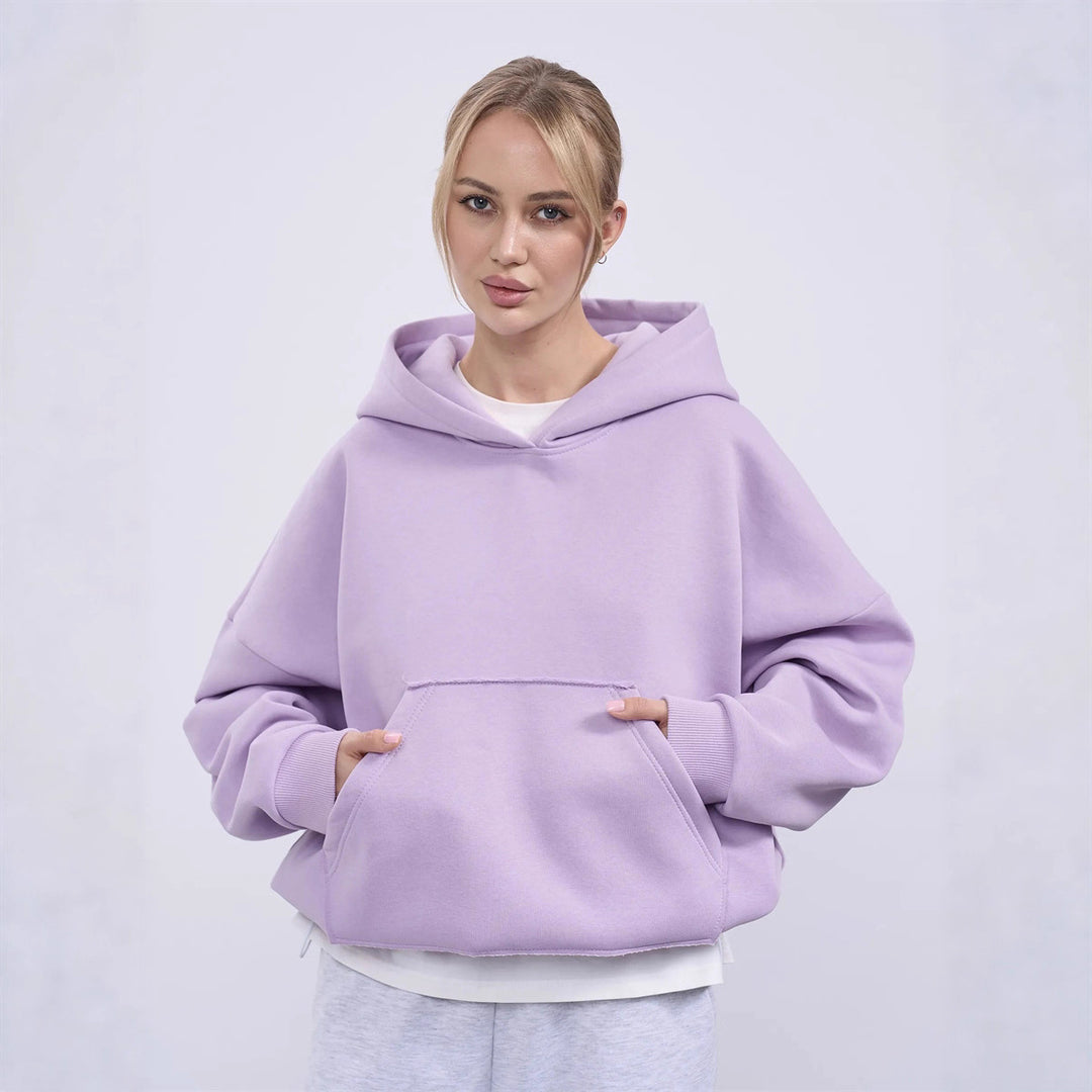 Dammens oversized huvtröja med sidofickor och avslappnad passform Mirla-Eva Jonsson