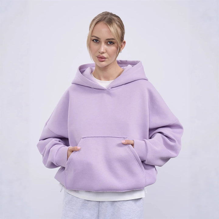 Dammens oversized huvtröja med sidofickor och avslappnad passform Mirla-Eva Jonsson