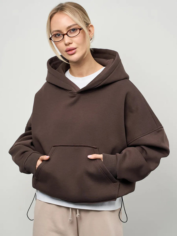 Dammens oversized huvtröja med sidofickor och avslappnad passform Mirla-Eva Jonsson