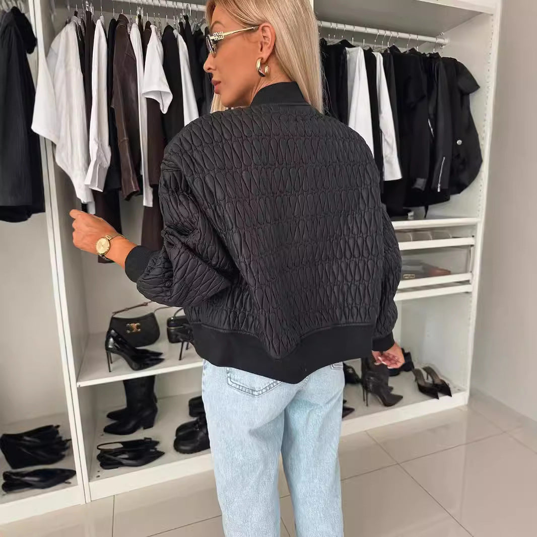 Dammens quiltad jacka med elastiska mudd och genomgående dragkedja Mirla-Eva Jonsson