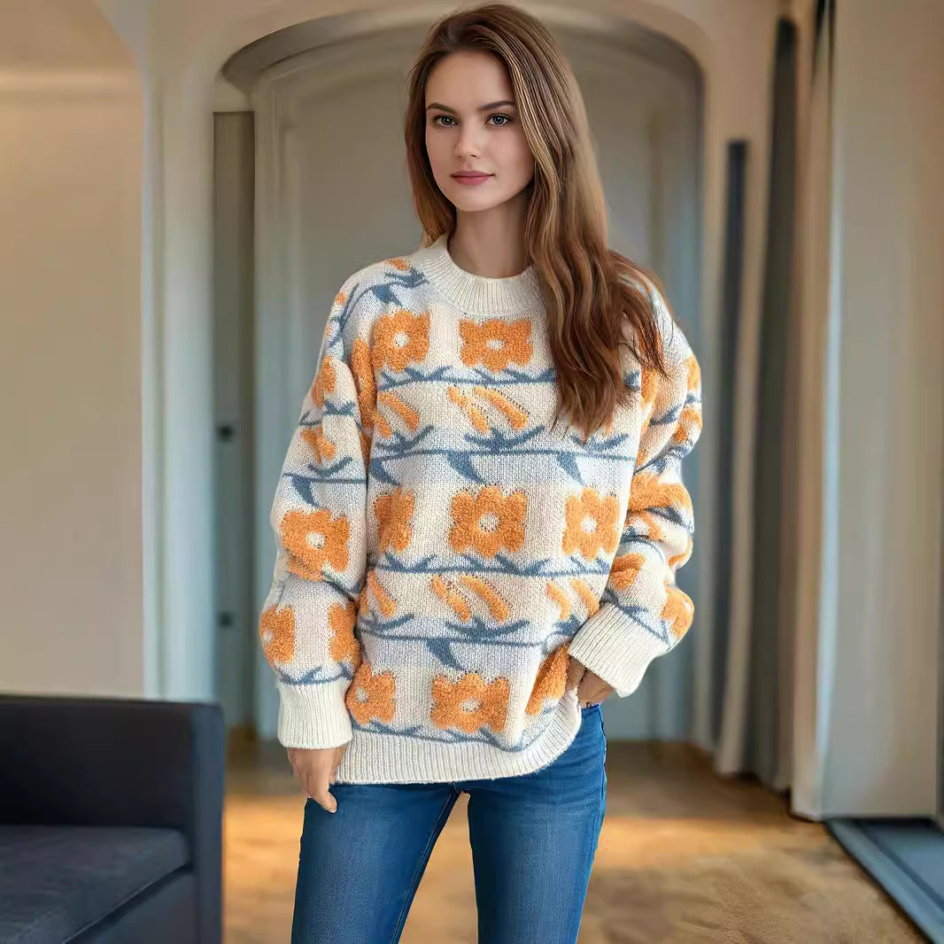 Dammens stickad tröja med blommönster och avslappnad passform Mirla-Eva Jonsson