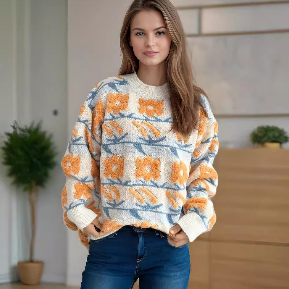 Dammens stickad tröja med blommönster och avslappnad passform Mirla-Eva Jonsson
