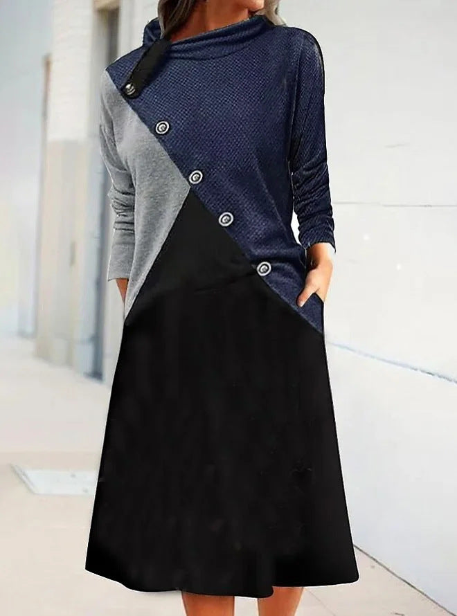 Damoverall med asymmetrisk design och trendiga knappproppar Mirla-Eva Jonsson