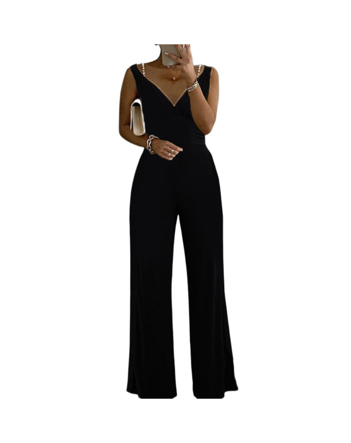 Damoverall med elegant V-ringning och flödande snitt Mirla-Eva Jonsson