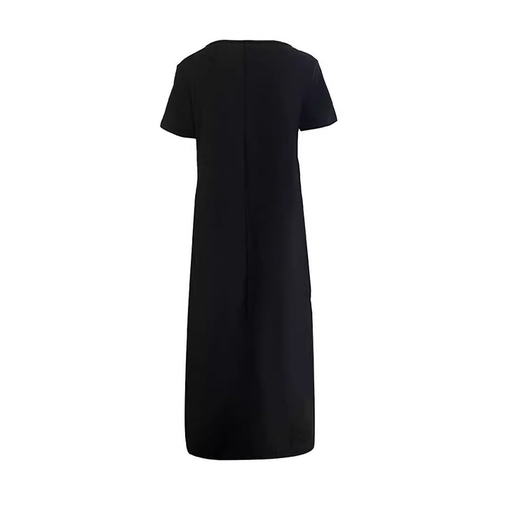 Damoversize T-shirt-klänning med grafiskt tryck och praktiska fickor Mirla-Eva Jonsson