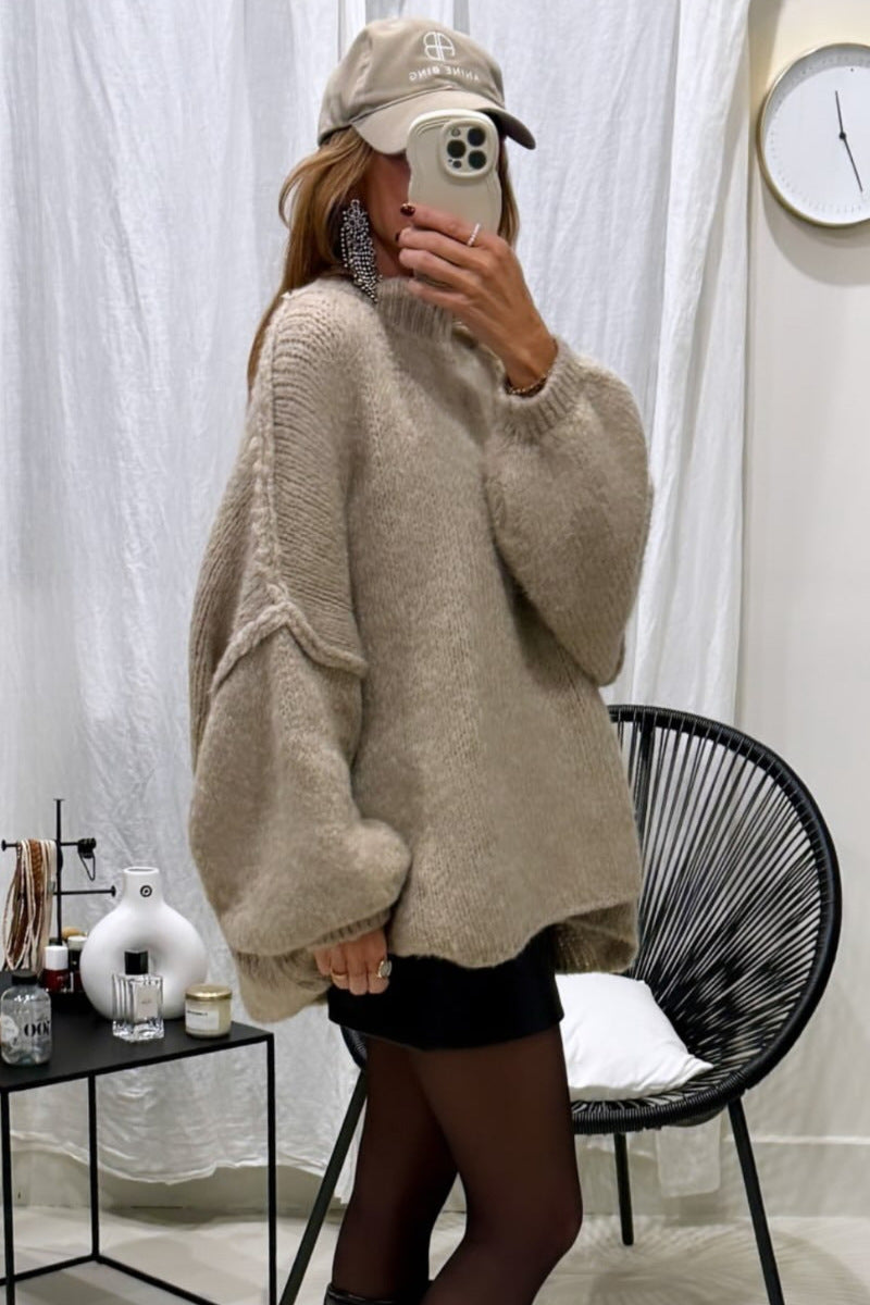 Damoversize stickad tröja med mjukt material och modiga ärmar Mirla-Eva Jonsson