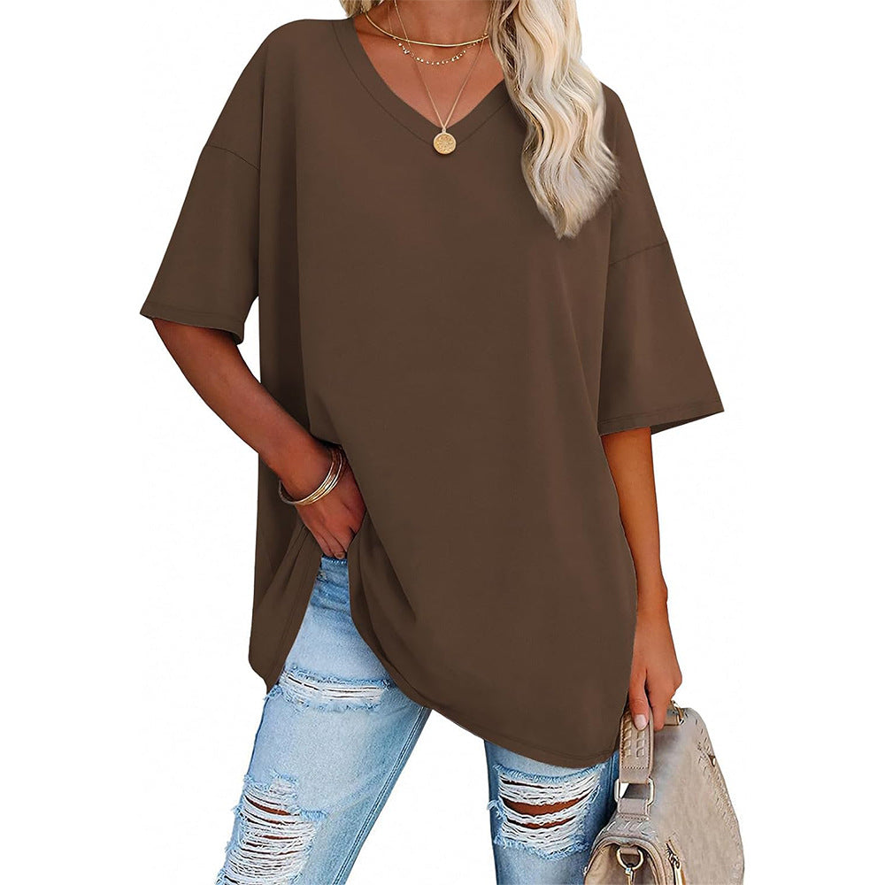 Damoversized T-shirt med V-ringning och sidofickor Mirla-Eva Jonsson